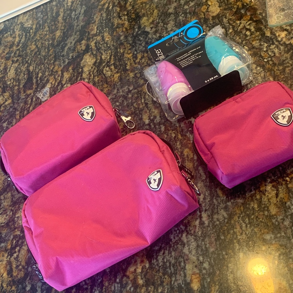 Heys Set of 3 pink travel pouches NWOT, plus 3 travel bottles NET